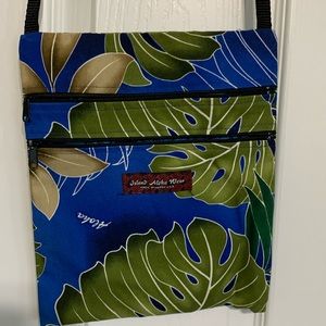 Crossbody bag in beautiful Hawaiian fabric print. 45” strap.